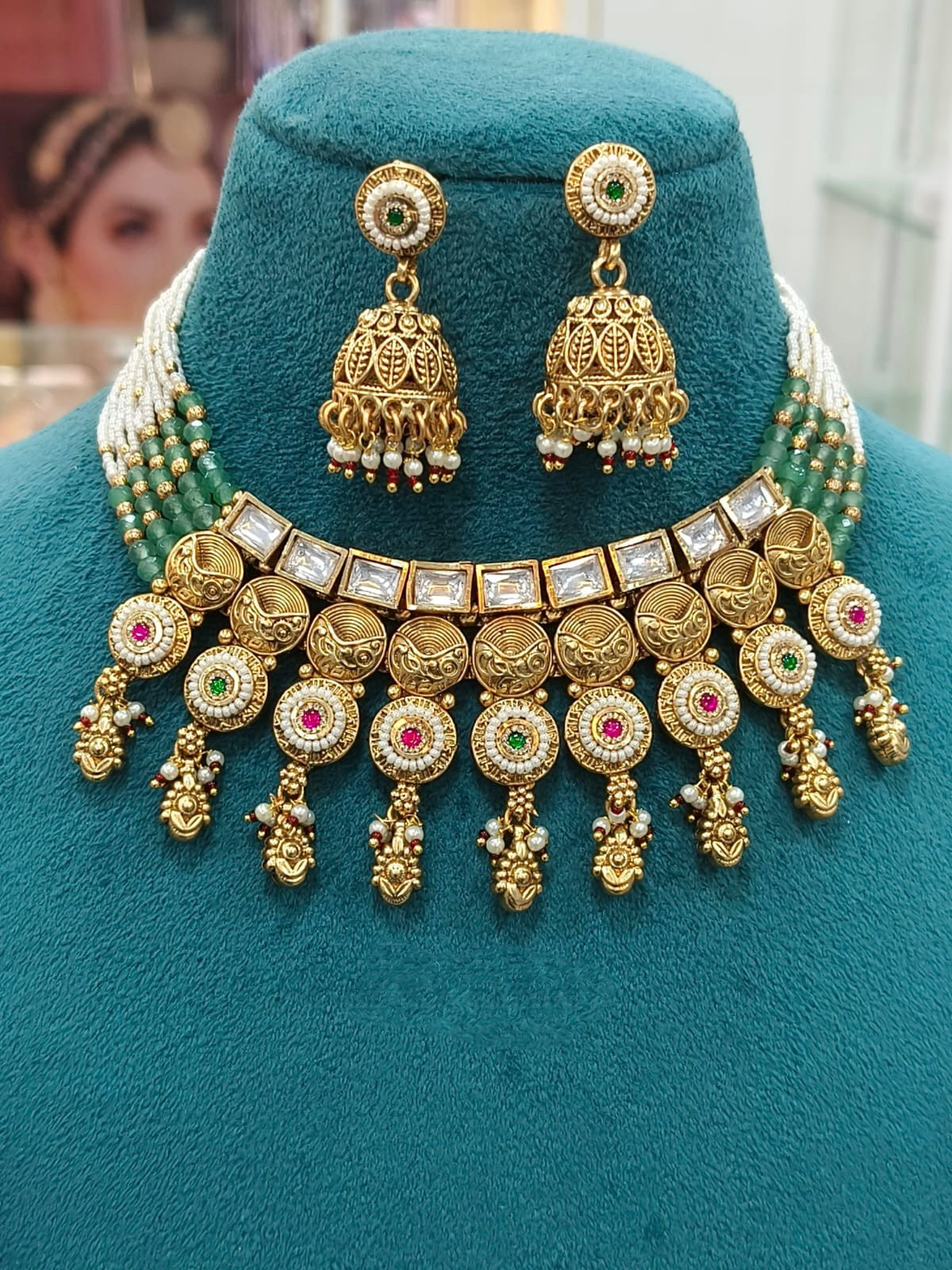 Gold-Plated Temple Necklace with Emerald Accents