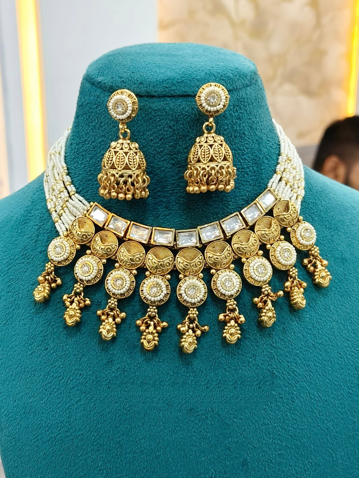 Gold Choker Set with Kundan, Beads, and Jhumkas