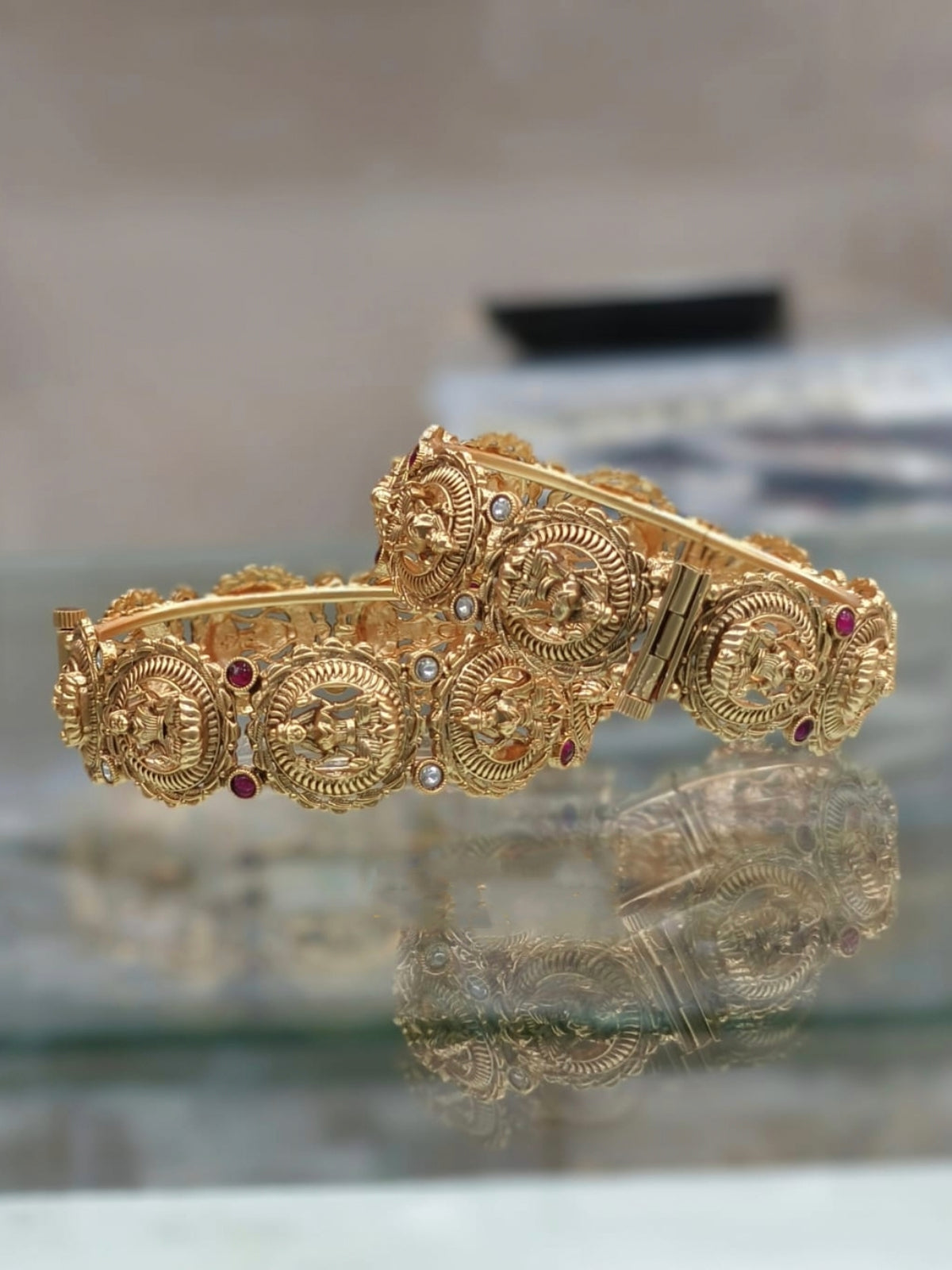 Temple Gold Bangles with Lakshmi Motif and Gemstones