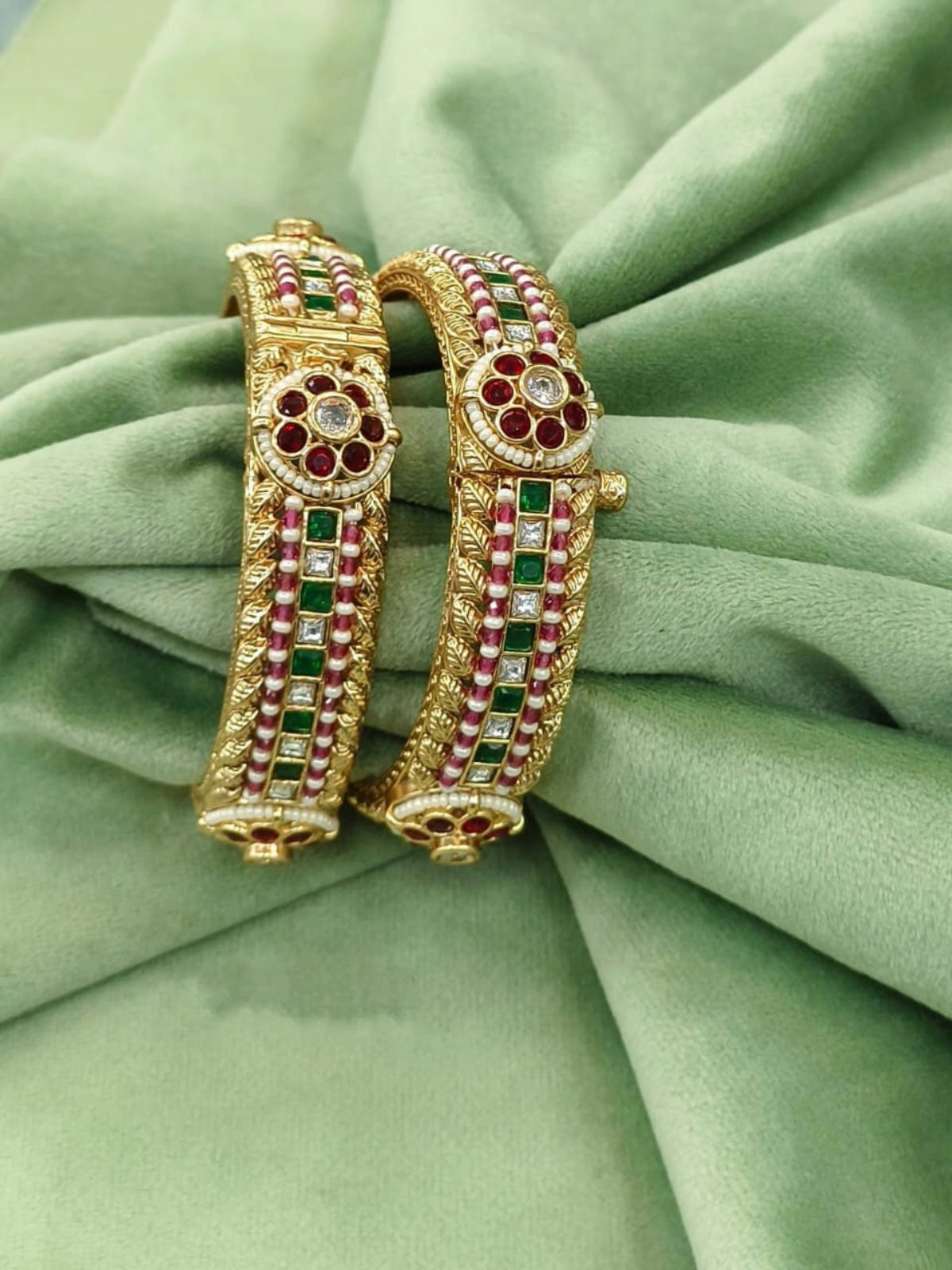 Traditional Gold Bangles with Ruby, Emerald, and Pearl Detailing