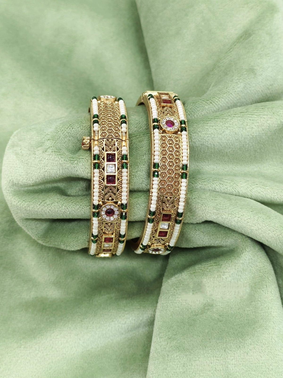 Gold Bangles with Intricate Green, White, and Ruby Detailing