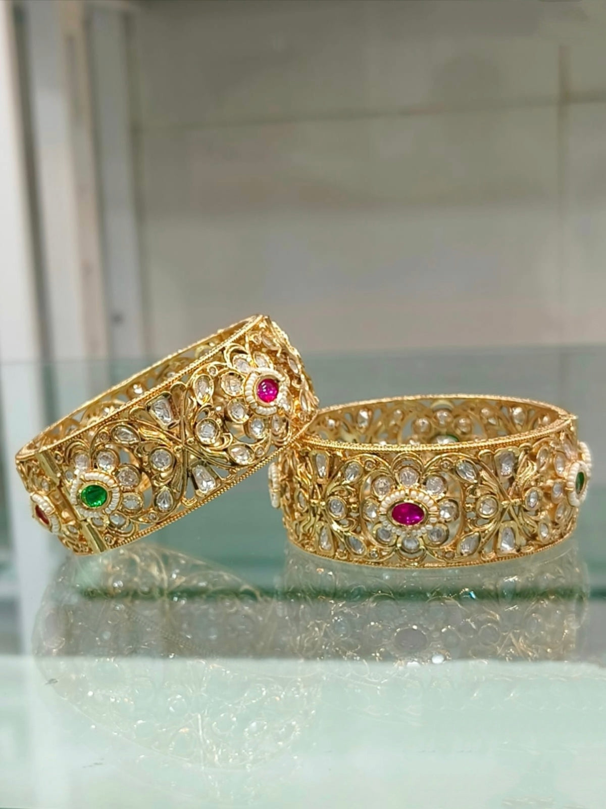 Gold Bangles with Ruby, Emerald, and Kundan Detailing