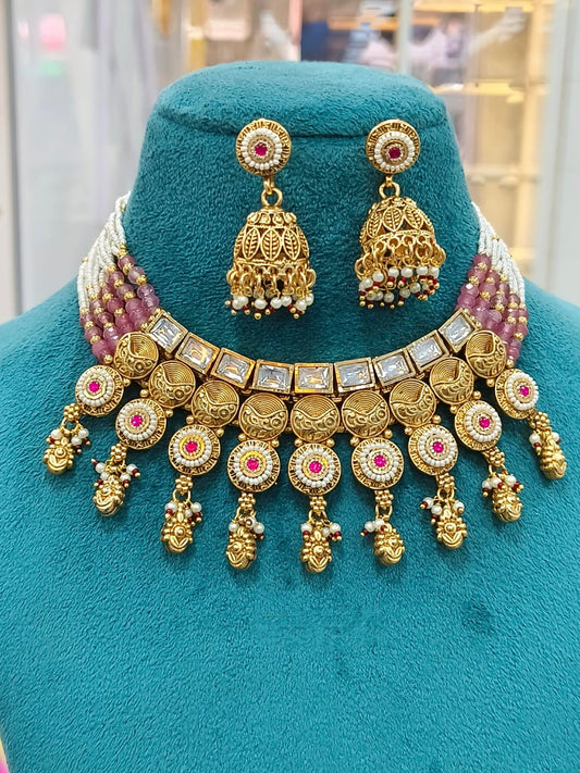 Temple Gold Necklace and Jhumka Set with Ruby Accents