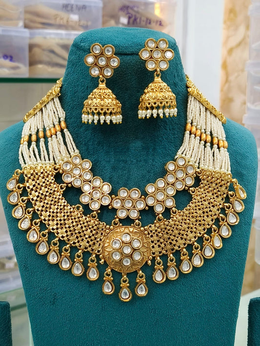 Gold Polki Choker Set with Pearls and Jhumka Earrings
