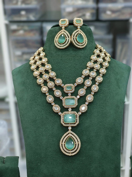 Opulent Gold Necklace Set with Green Stone Accents