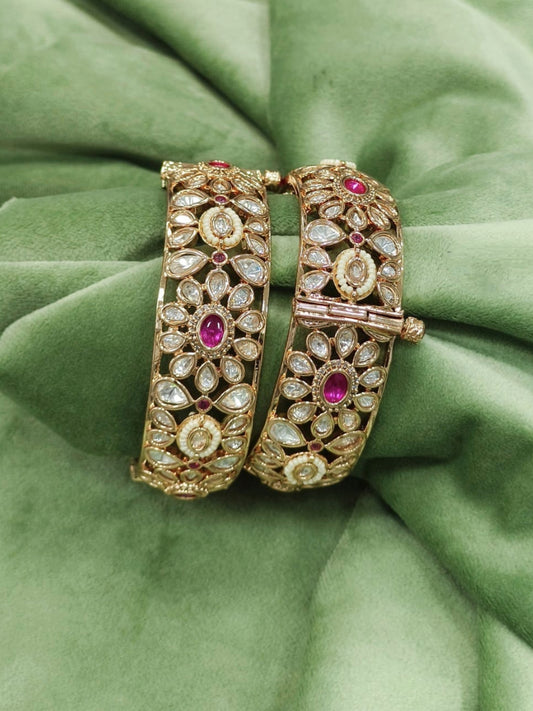 Gold-Plated Bangles with Intricate Floral Design and Ruby Accents