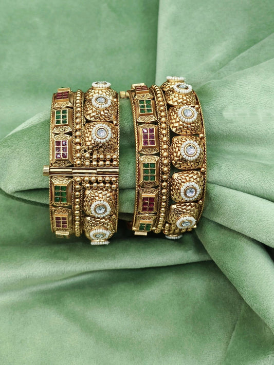 Traditional Gold Bangles with Detailed Kundan and Ruby Accents